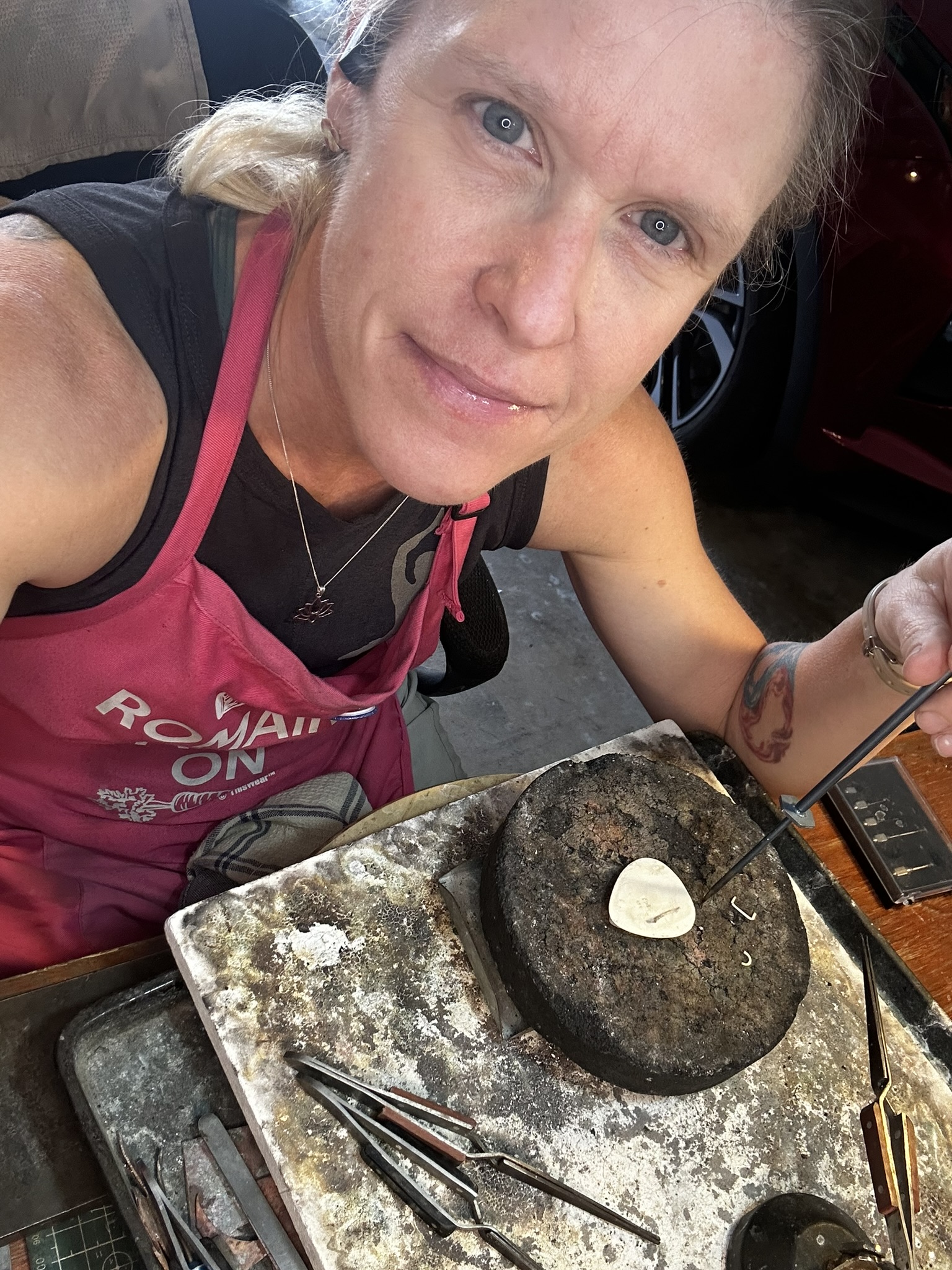 Sara Miller at her art work bench